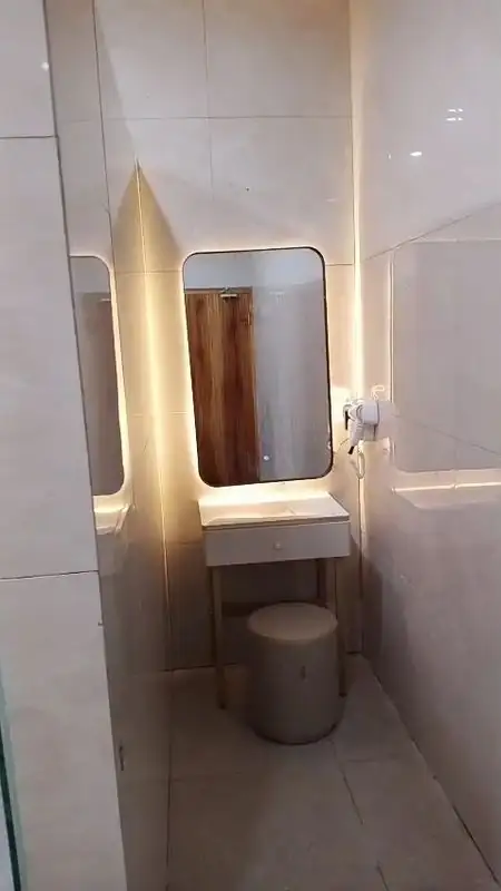 Backlit mirror in the washroom